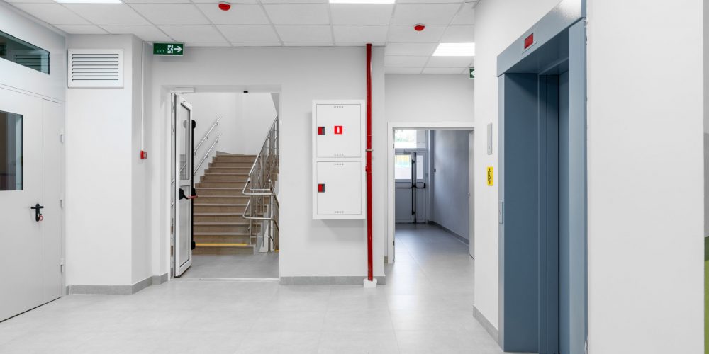 clean-and-modern-hallway-with-elevators-and-stairw-2026-01-08-06-57-56-utc