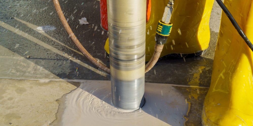 drills-a-hole-in-a-concrete-drilling-with-steel-a-2026-01-09-08-29-01-utc